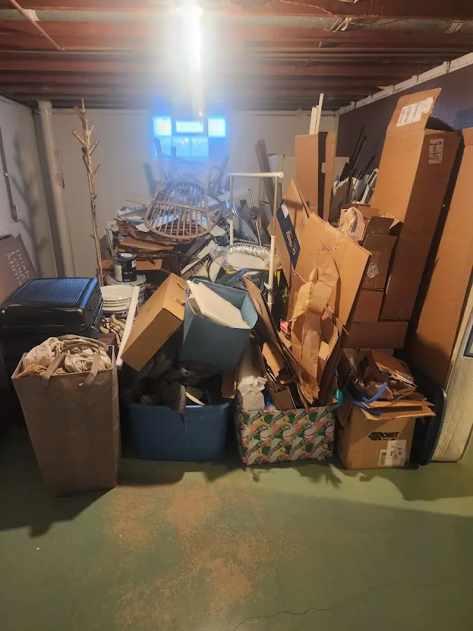 Roll-off dumpster container at job site for 2 Yard Dumpster Rental in Hallandale Beach